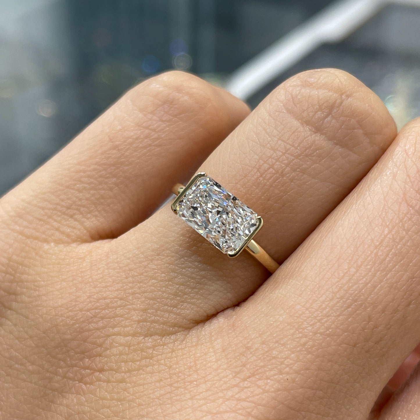 IGI lab diamond Radiant cut 1.8ct half bezel east west ring
