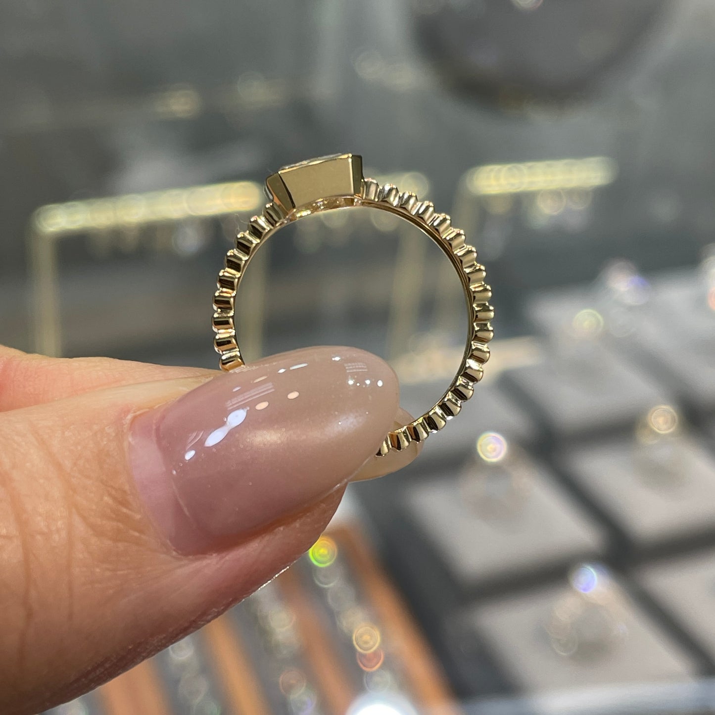 Lab diamond Radiant cut 0.6ct horizontal bezel set with vertical line band ring