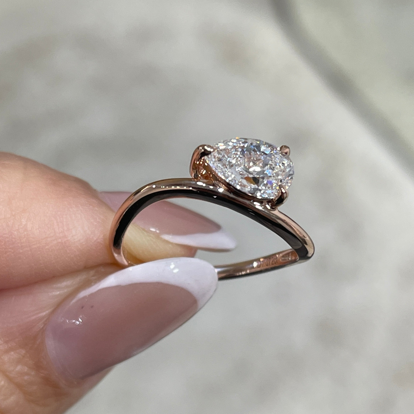 Lab diamond Pear shape 1ct three-prong wavy ring