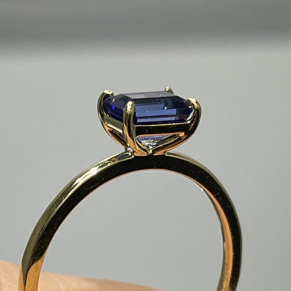 Lab sapphire cornflower color emerald cut 0.9ct solitaire ring