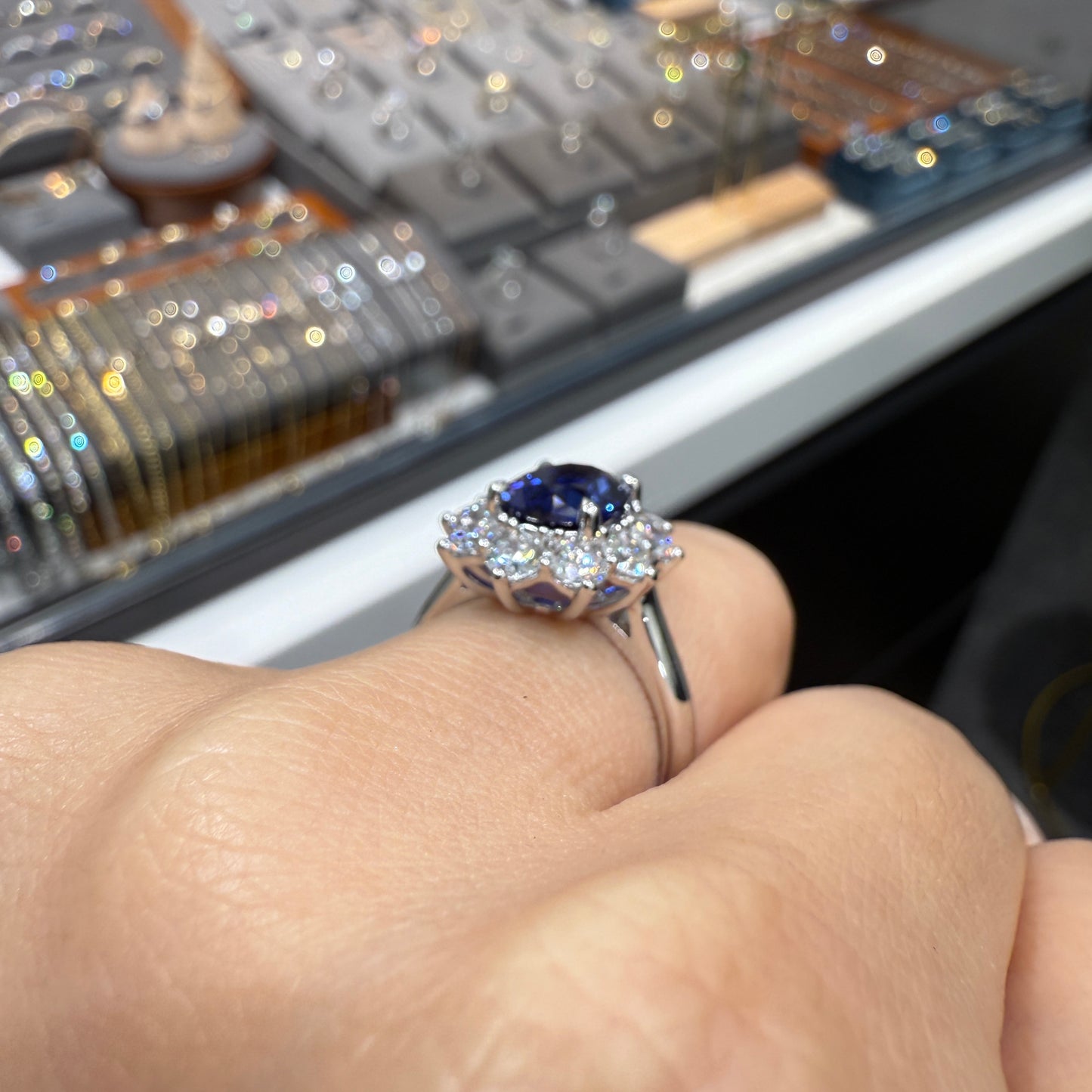 Lab grown Sapphire royal blue Oval 2.5ct halo ring