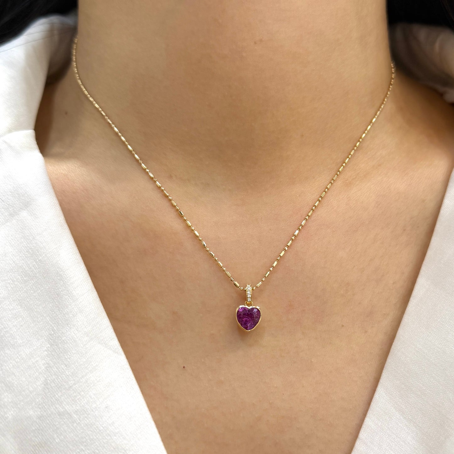 Lab purple sapphire
heart shape 1ct
bezel pave open clip pendant