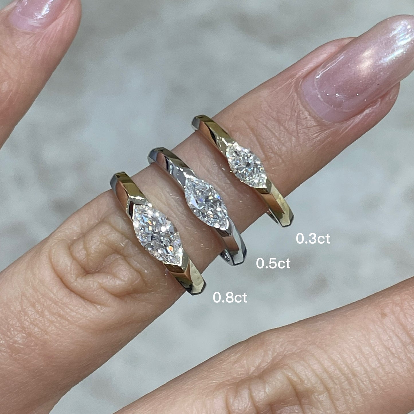 9k Lab diamond marquise 0.8ct east west horizontal ring