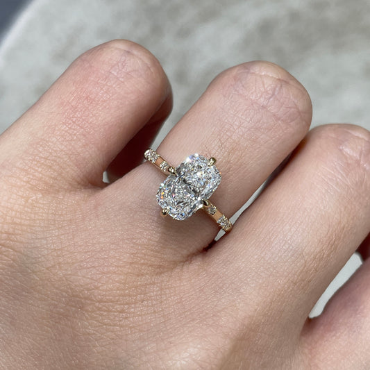 IGI Lab diamond long cushion cut 2.5ct four-prong compass underhalo side stone ring