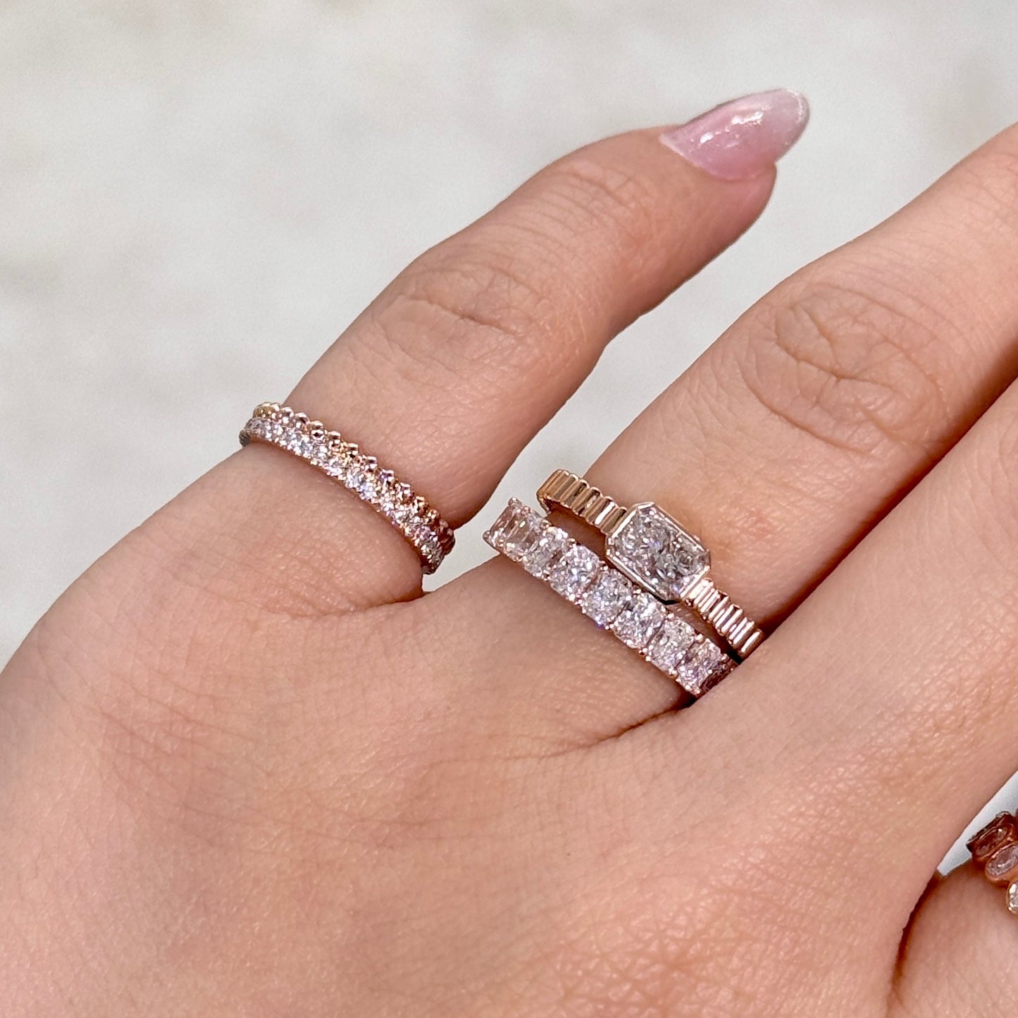 9k Lab diamond Radiant cut 0.6ct horizontal bezel set with vertical line band ring