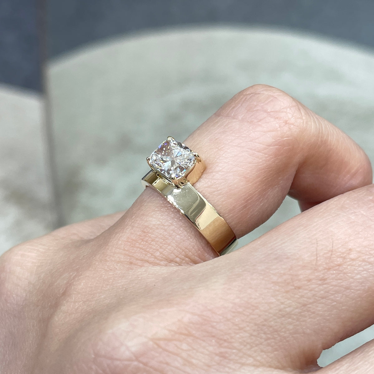 IGI Lab diamond long cushion shape 1.5ct four-prong horizontal top setting thick flat band ring