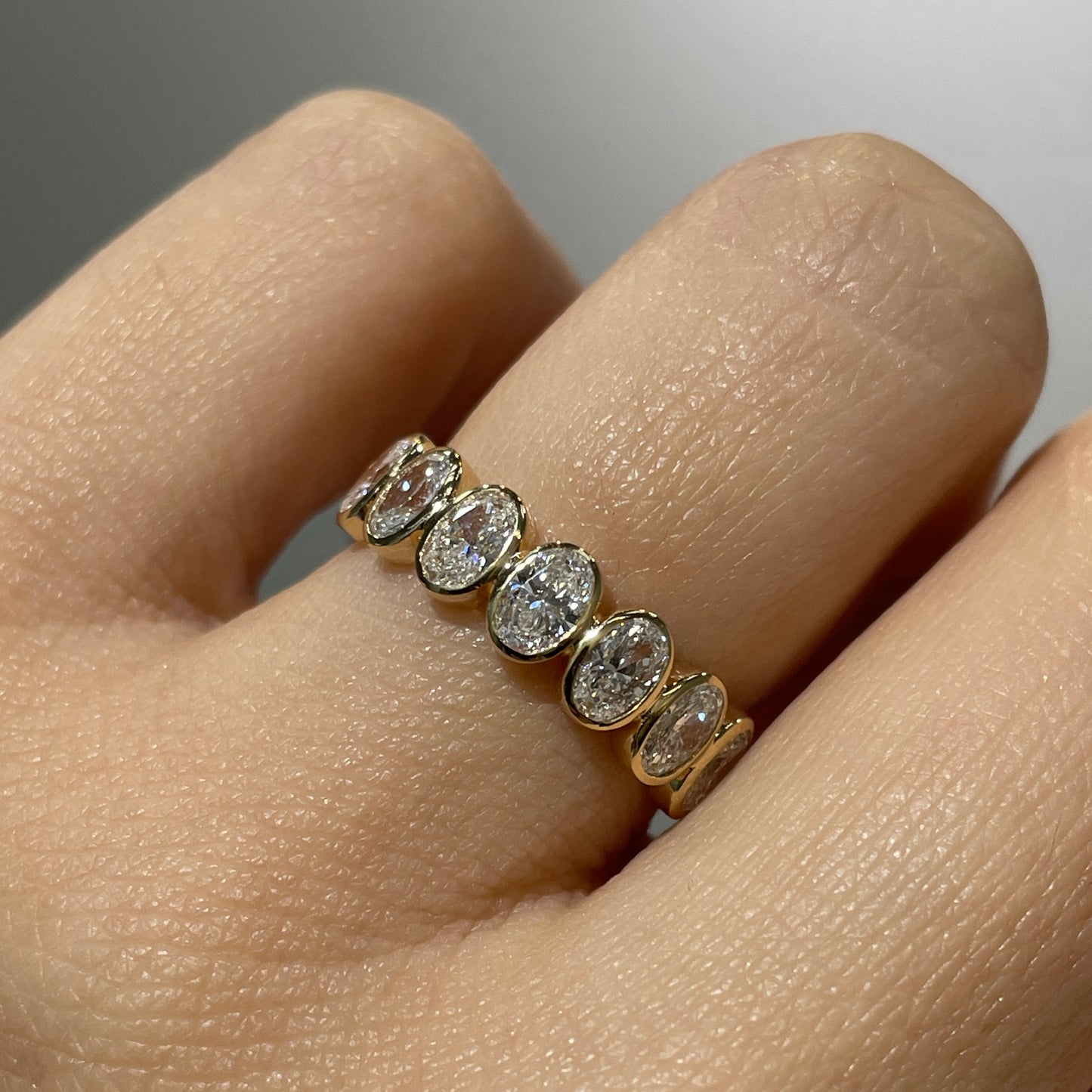 Lab diamond oval 1ct bezel half eternity ring