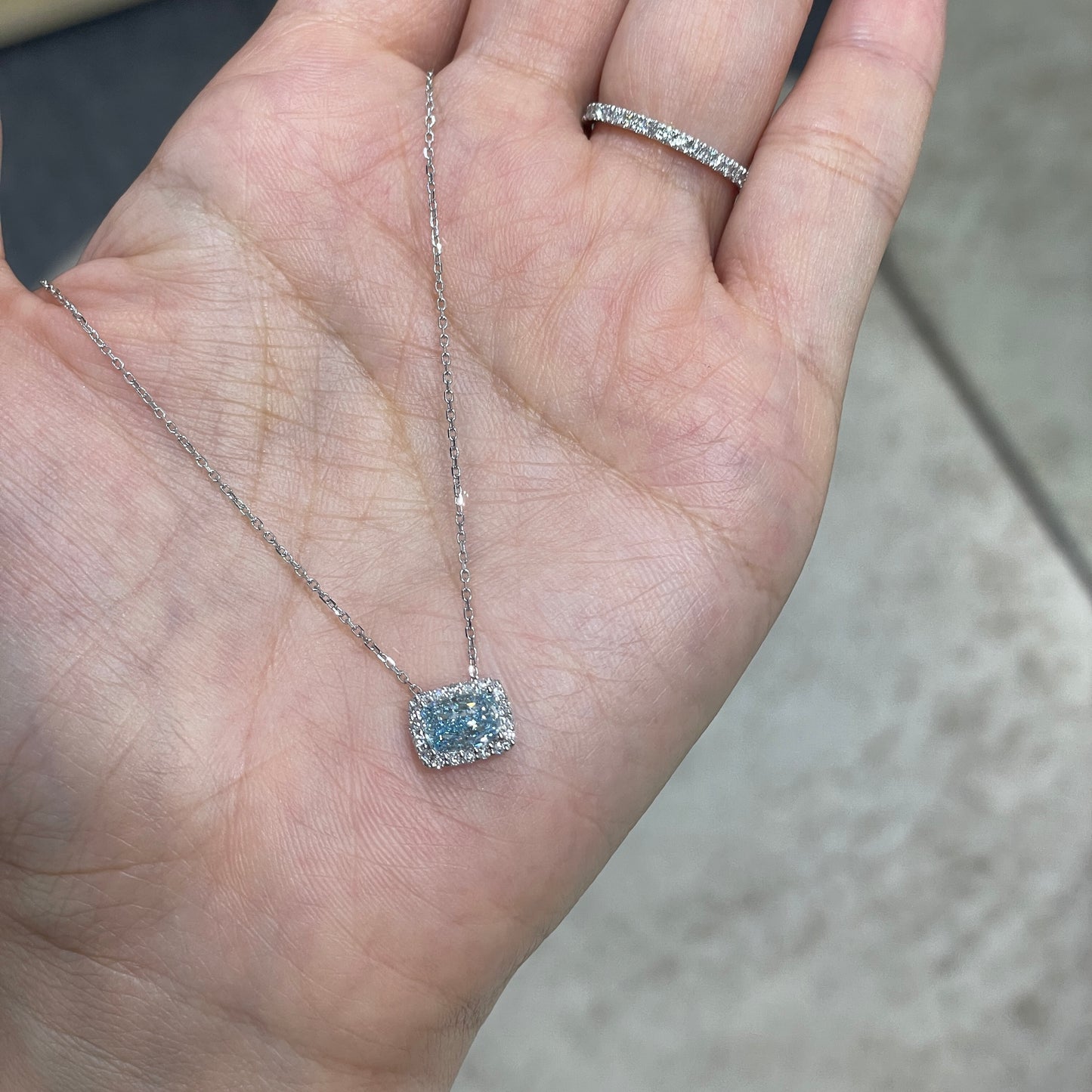 IGI lab blue diamond long cushion cut 1ct halo two-way pave ring
