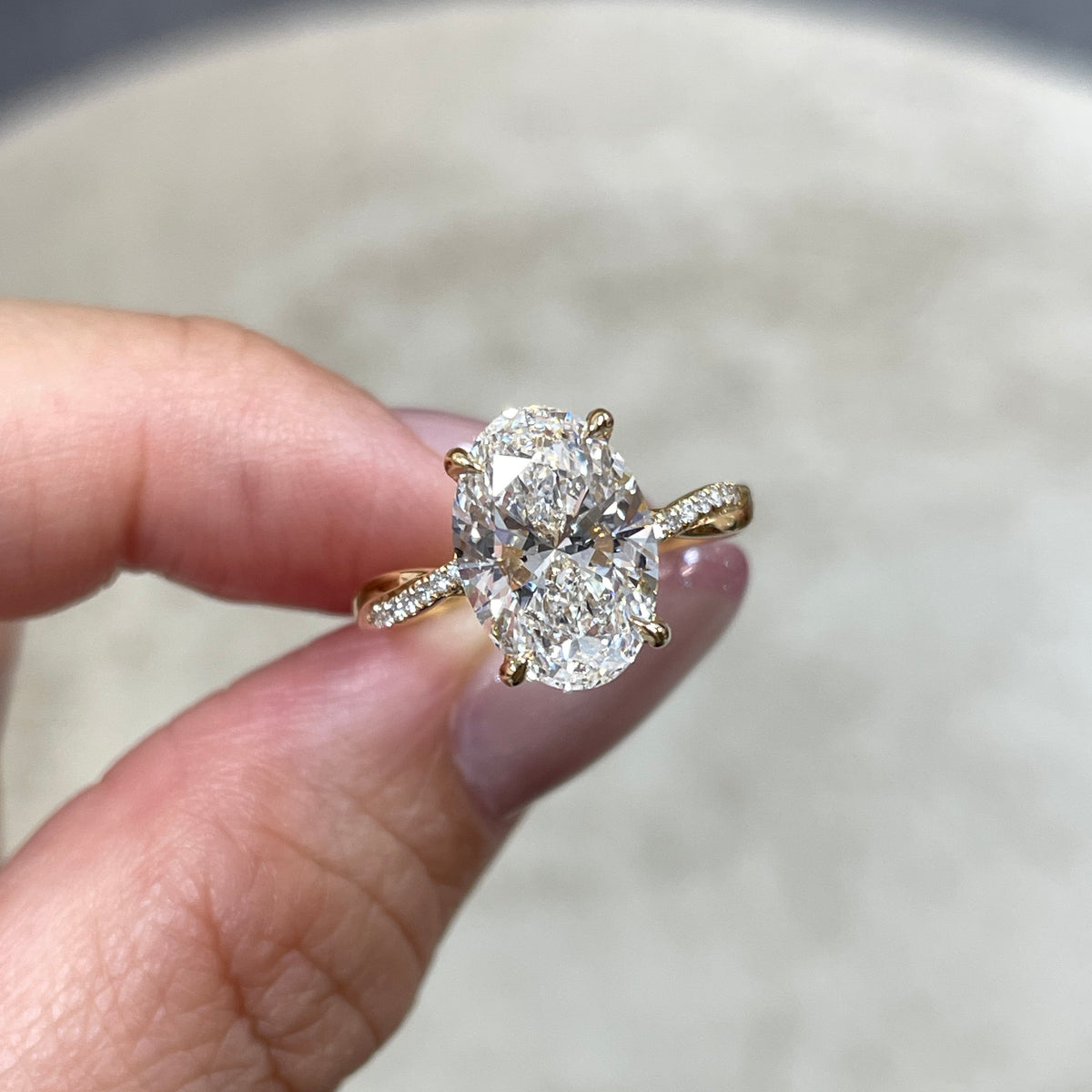 IGI Lab diamond Oval shape 3ct four-prong underhalo pave twisted band ring