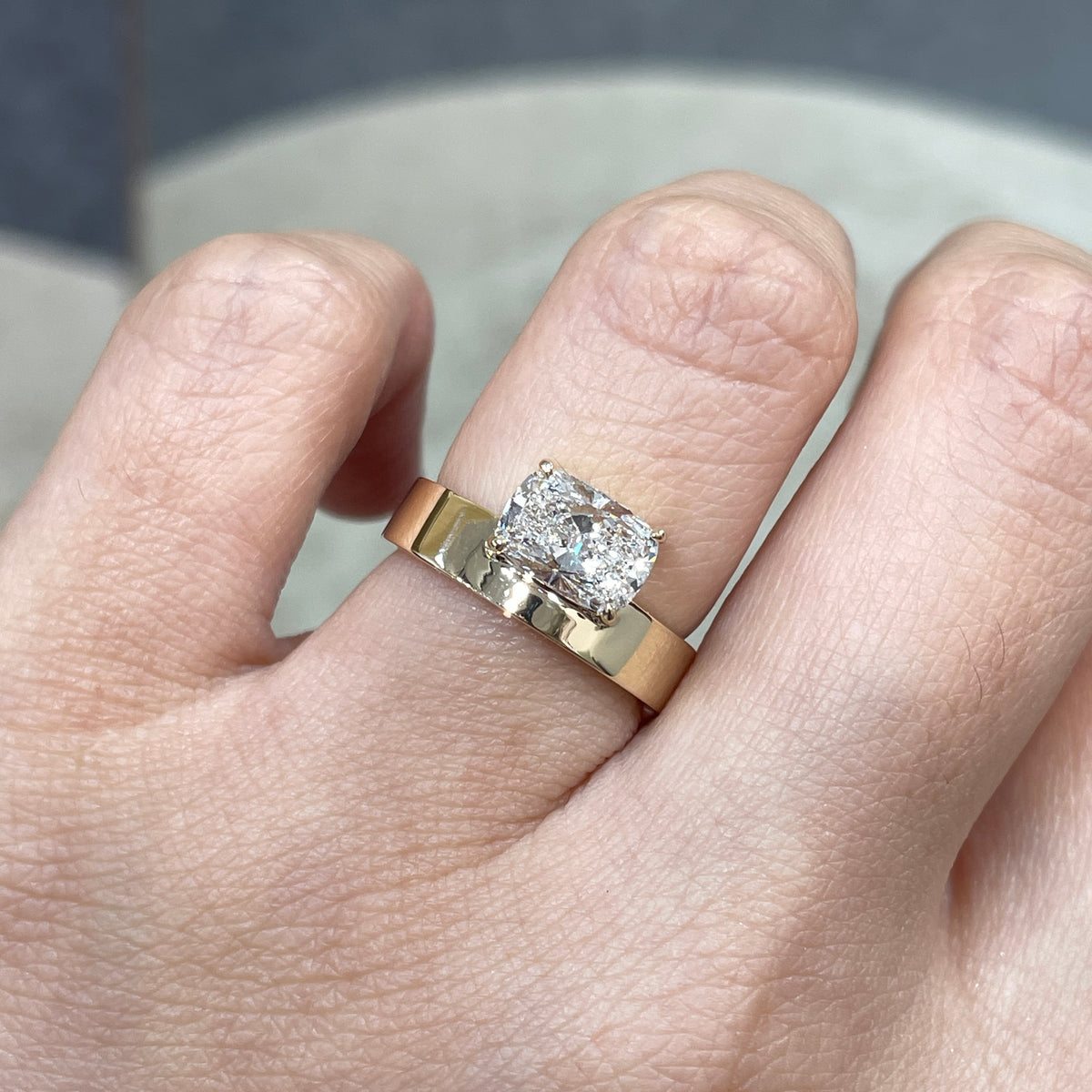 IGI Lab diamond long cushion shape 1.5ct four-prong horizontal top setting thick flat band ring