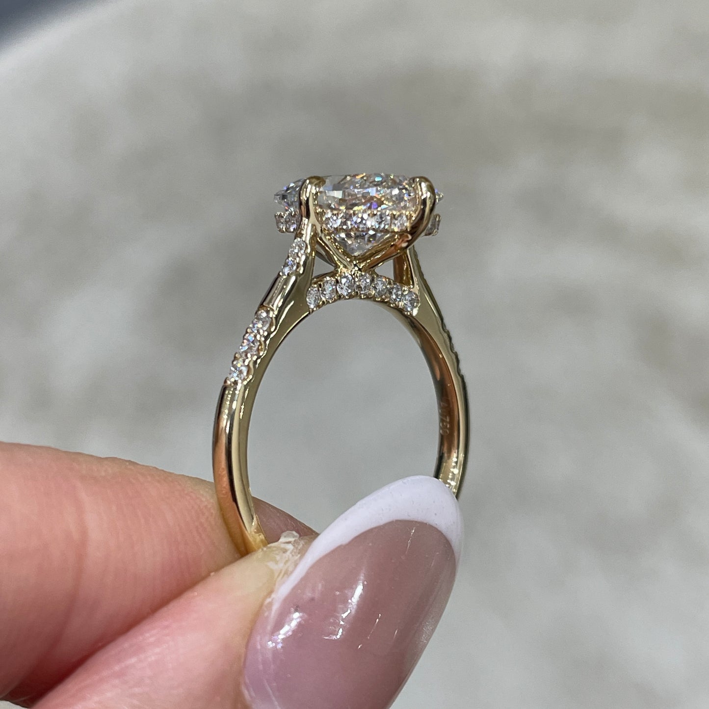 IGI Lab diamond long cushion cut 2.5ct four-prong compass underhalo side stone ring