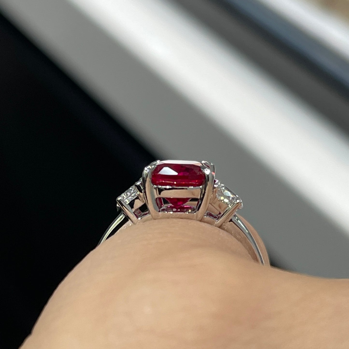 Lab pinkish rudy elongated cushion cut 2.5ct with diamond half moon 0.5ct three stone setting ring