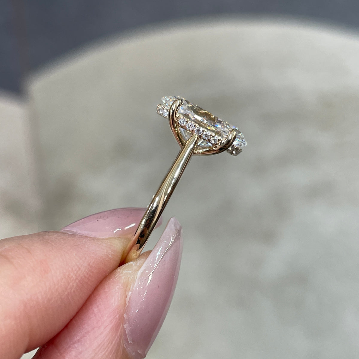IGI Lab diamond Oval 3.5ct four-prong underhalo ring