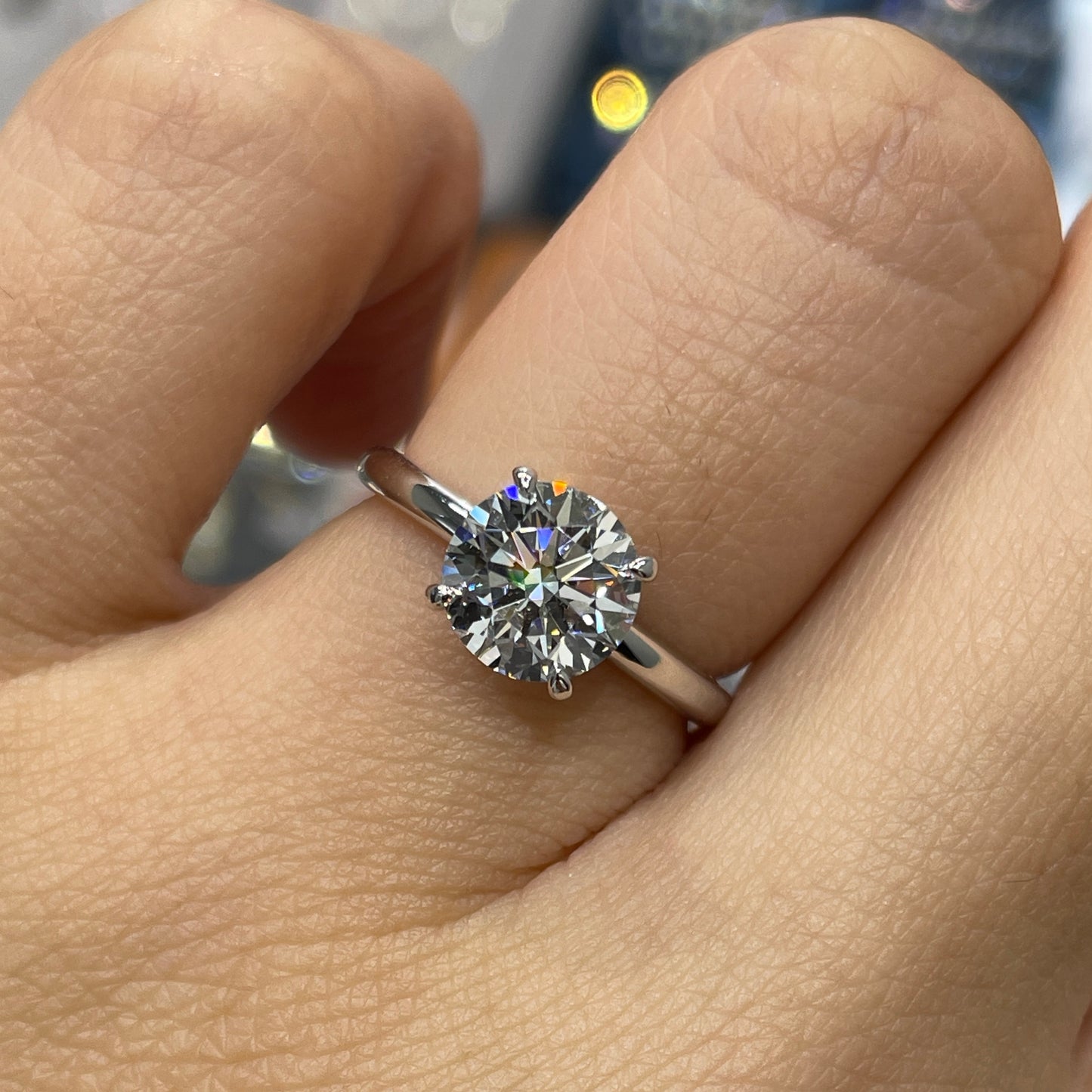 IGI lab diamond round 1.5ct four-prong low setting solitaire ring
