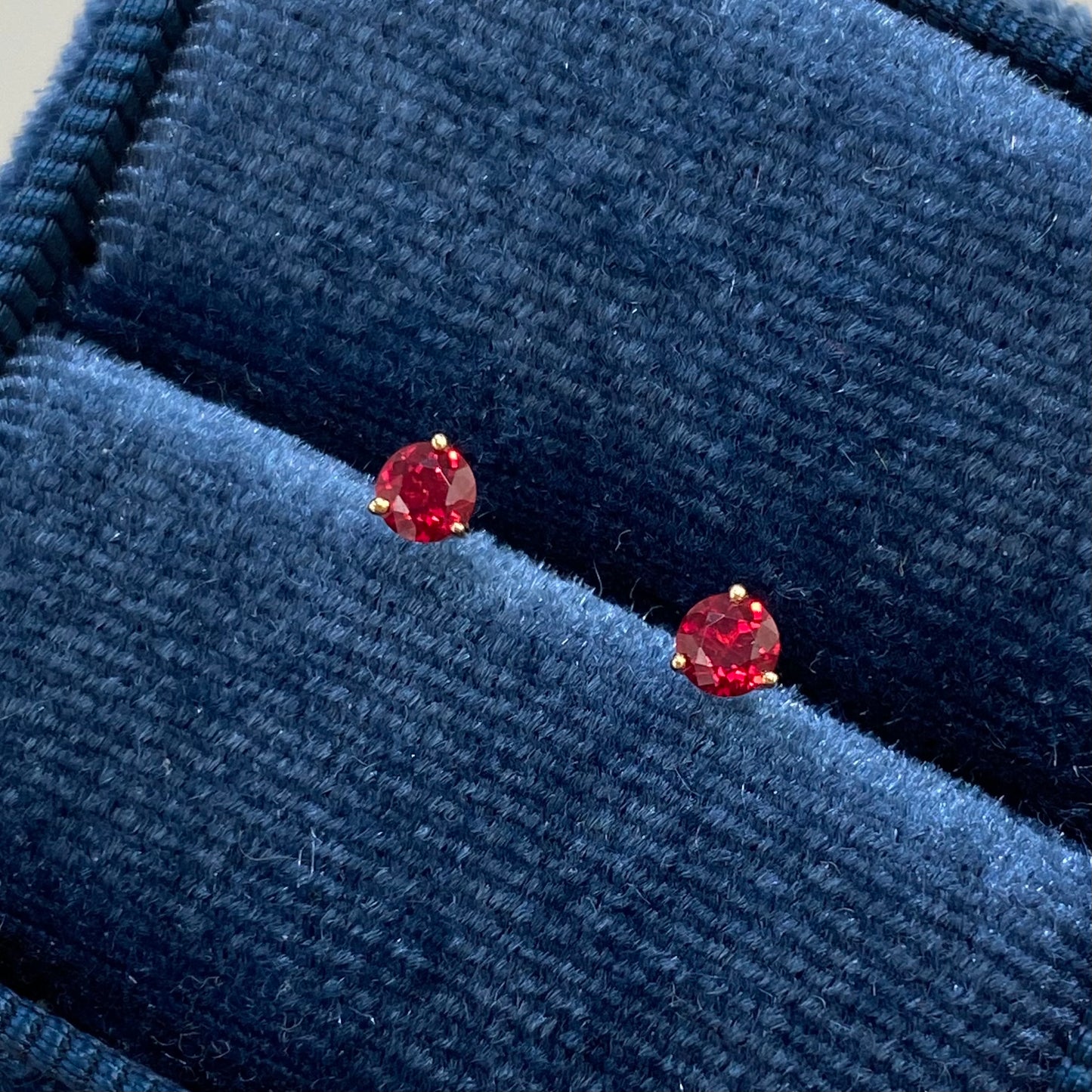 Lab grown ruby round 0.3ct stud earrings-pair
