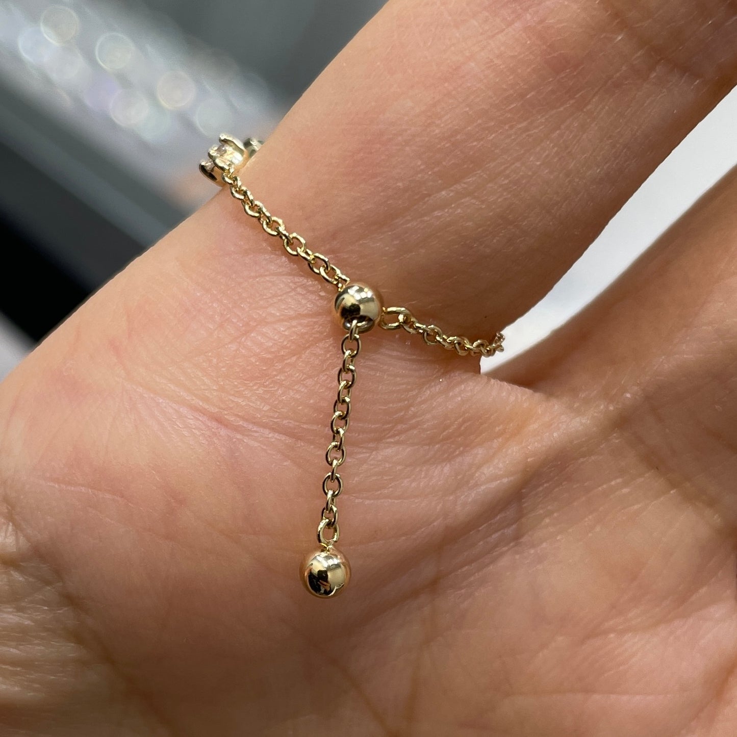 Lab Grown Emerald half bezel with little diamond chain ring