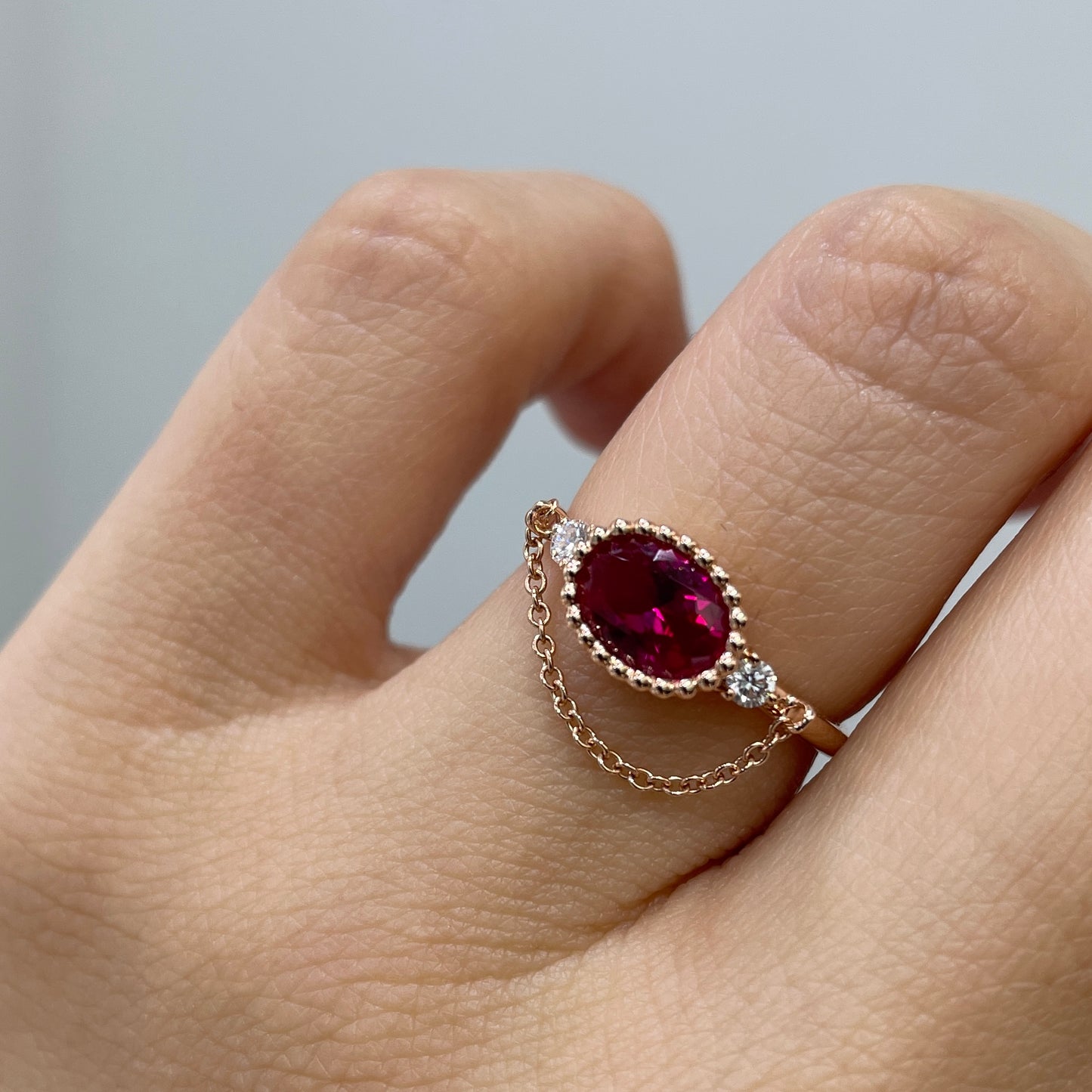 Lab Ruby Oval shape 0.8ct with diamond milgrain bezel chain ring