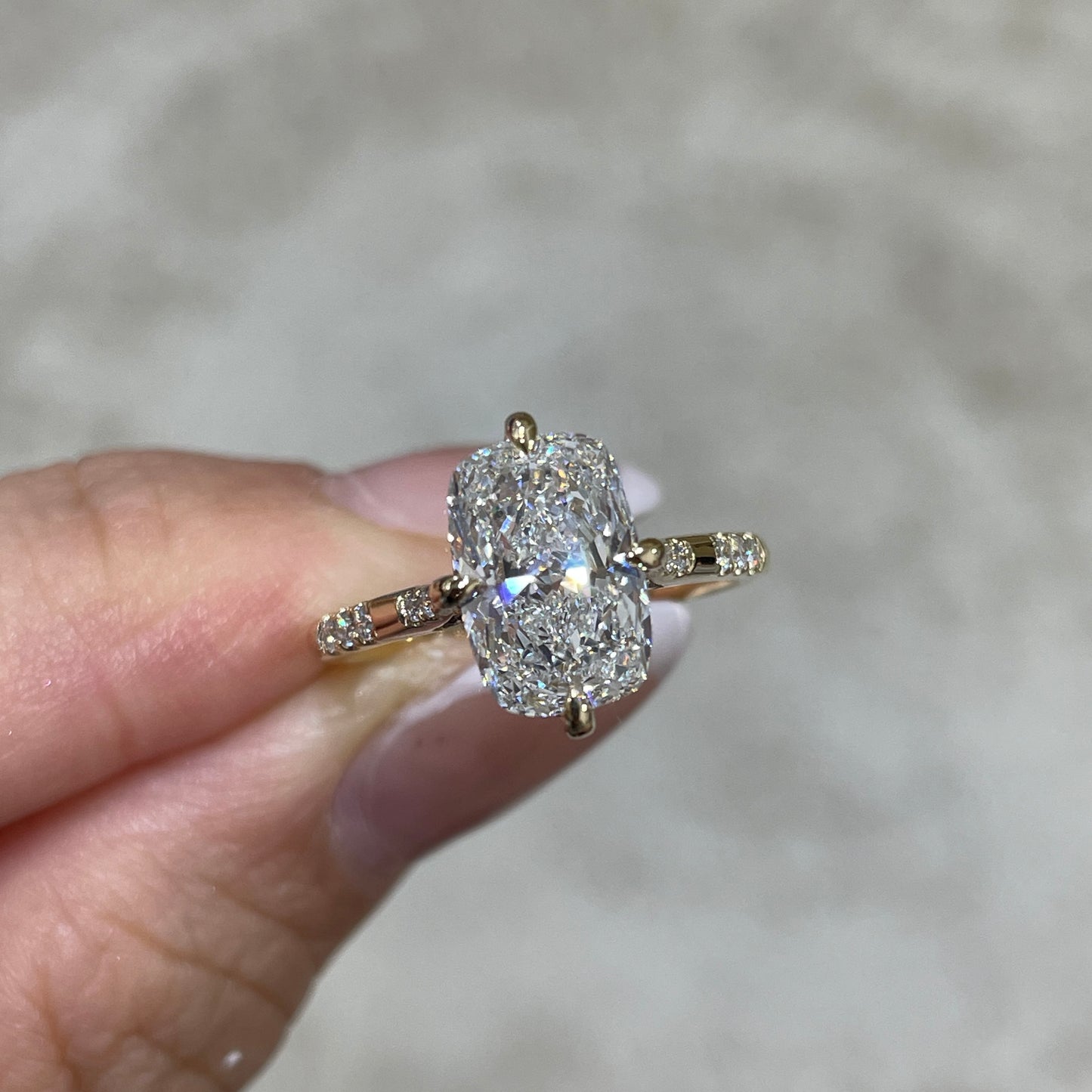 IGI Lab diamond long cushion cut 2.5ct four-prong compass underhalo side stone ring