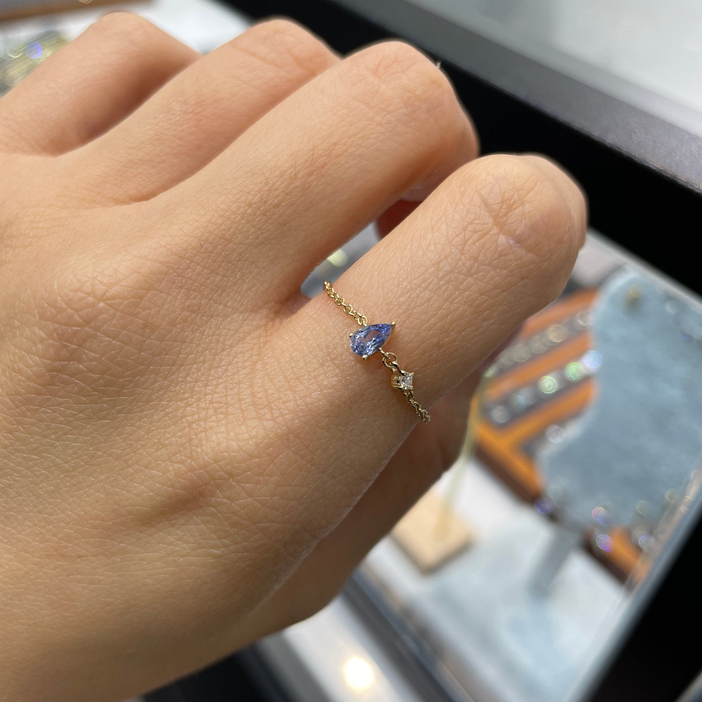Lab sapphire cornflower pear shape 0.2ct with little diamond chain ring