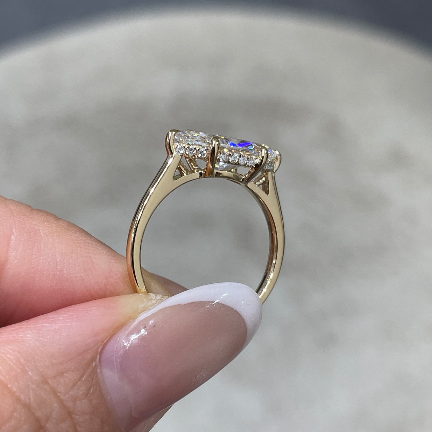 IGI lab diamond marquise shape 2ct four-prong underhalo east west ring