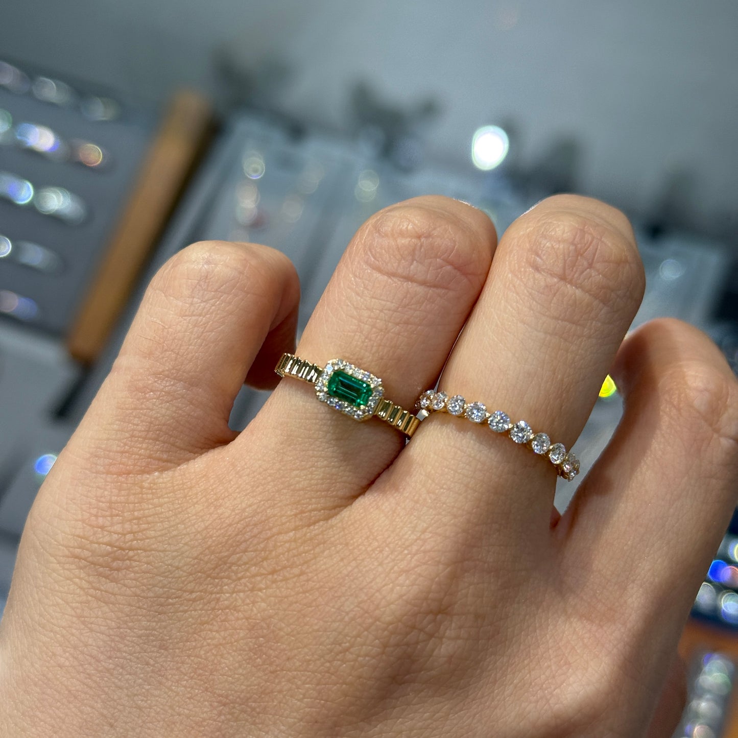 Lab Emerald emerald cut 0.25ct halo set with vertical line band ring