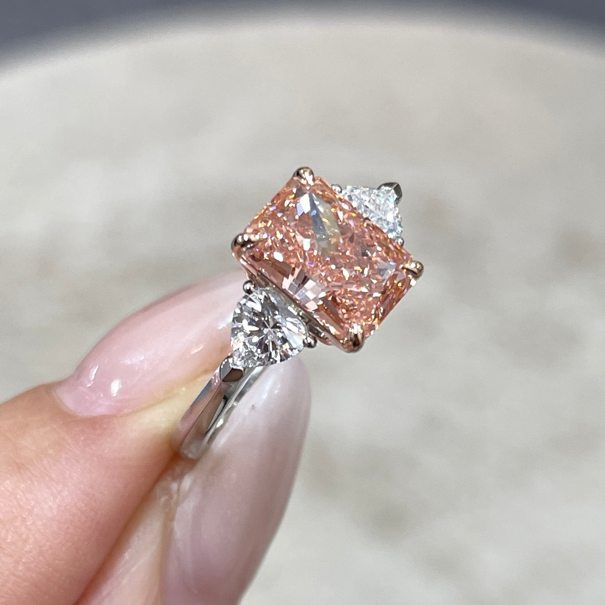 IGI pink diamond radiant 2ct with heart 0.5ct three stone setting two tone ring