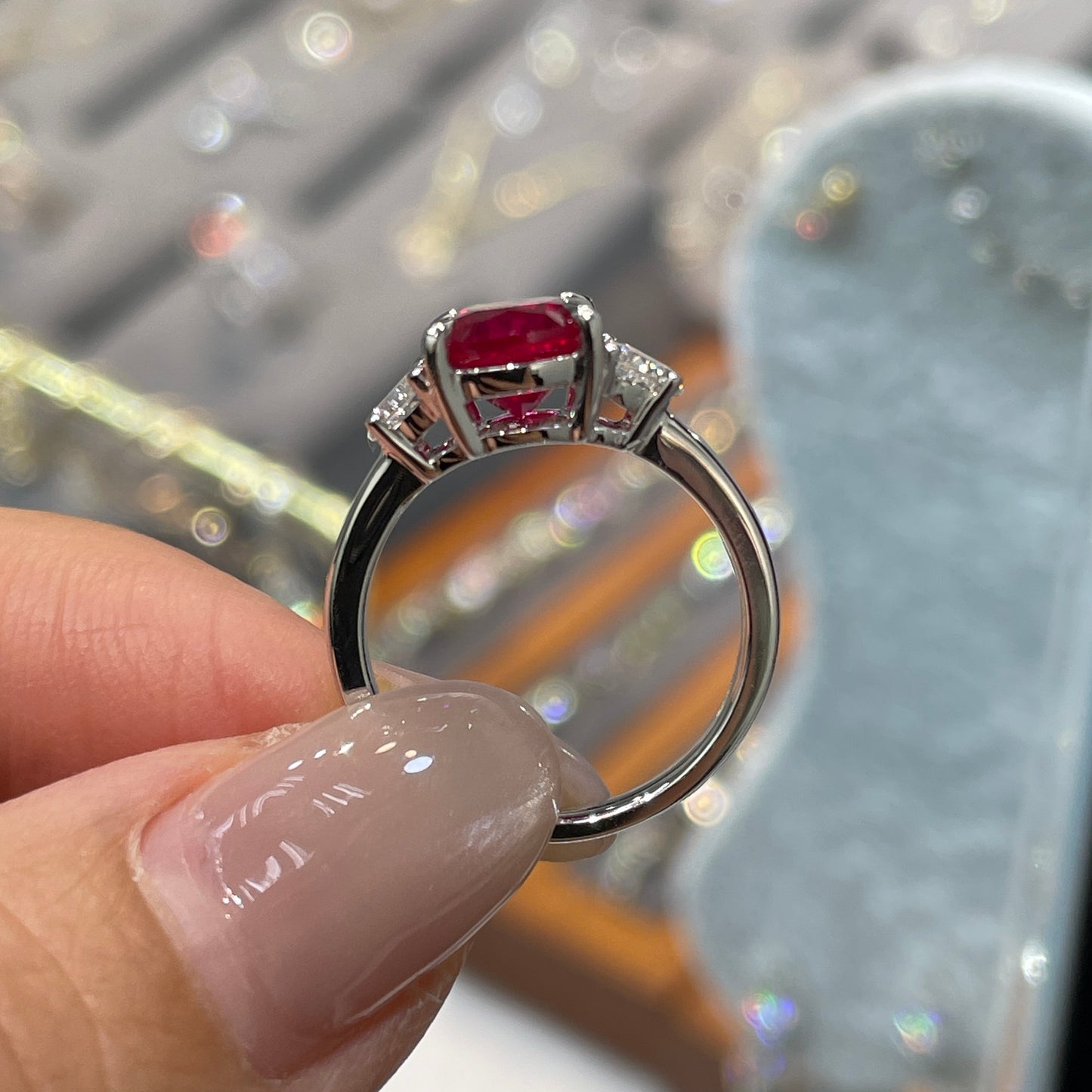 Lab pinkish rudy elongated cushion cut 2.5ct with diamond half moon 0.5ct three stone setting ring