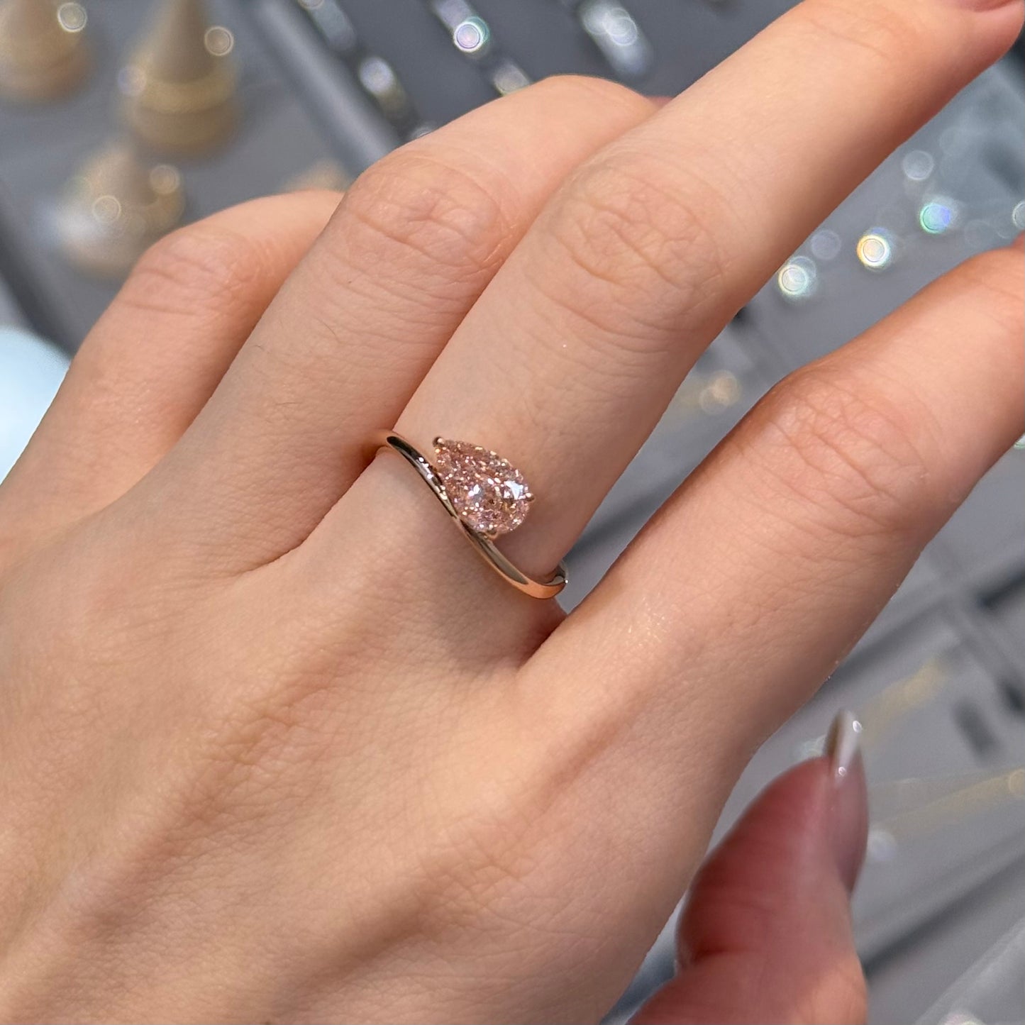 IGI lab pink diamind pear shape 1ct three-prong wavy ring
