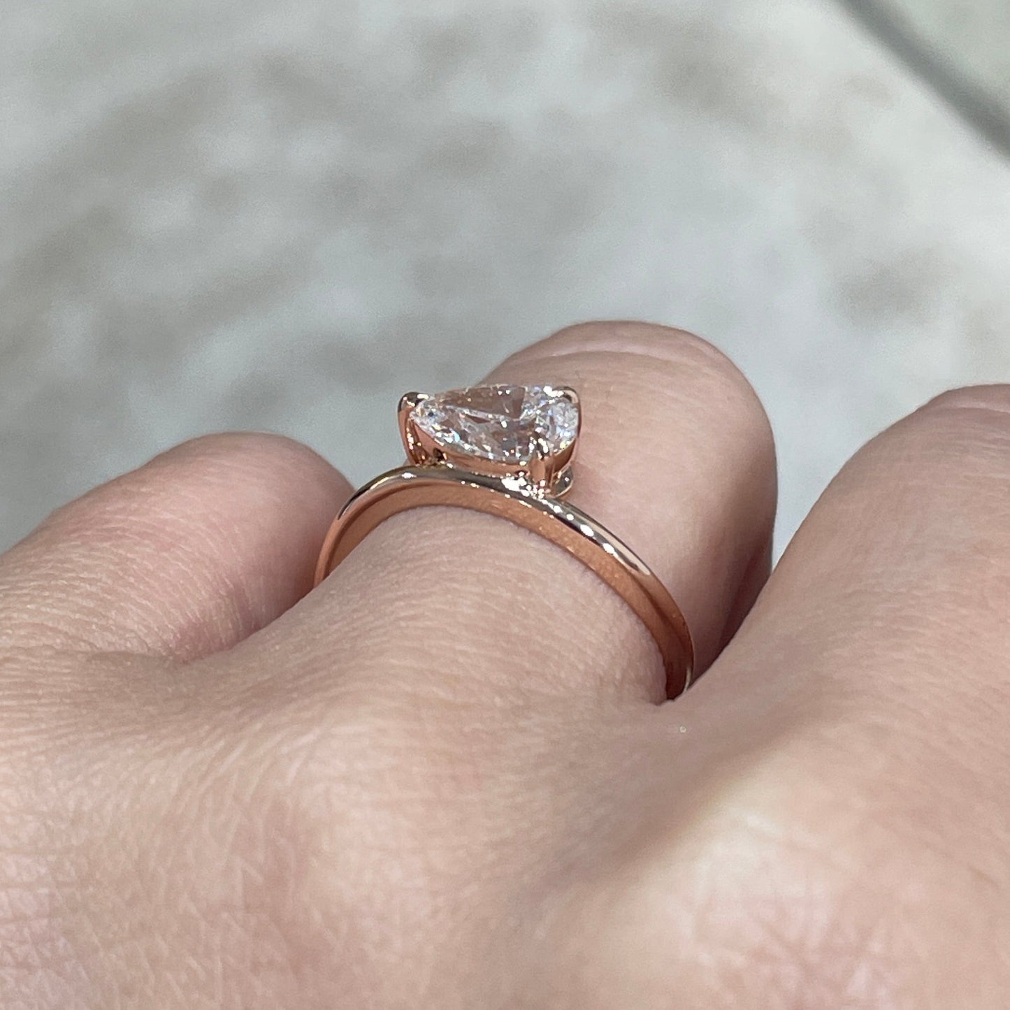 Lab diamond Pear shape 1ct three-prong wavy ring