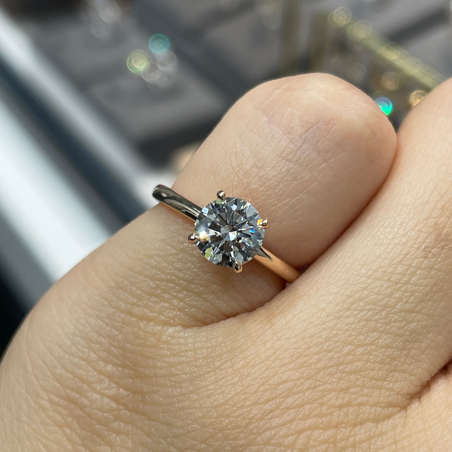 IGI lab diamond 1ct round four-prong underhalo ring