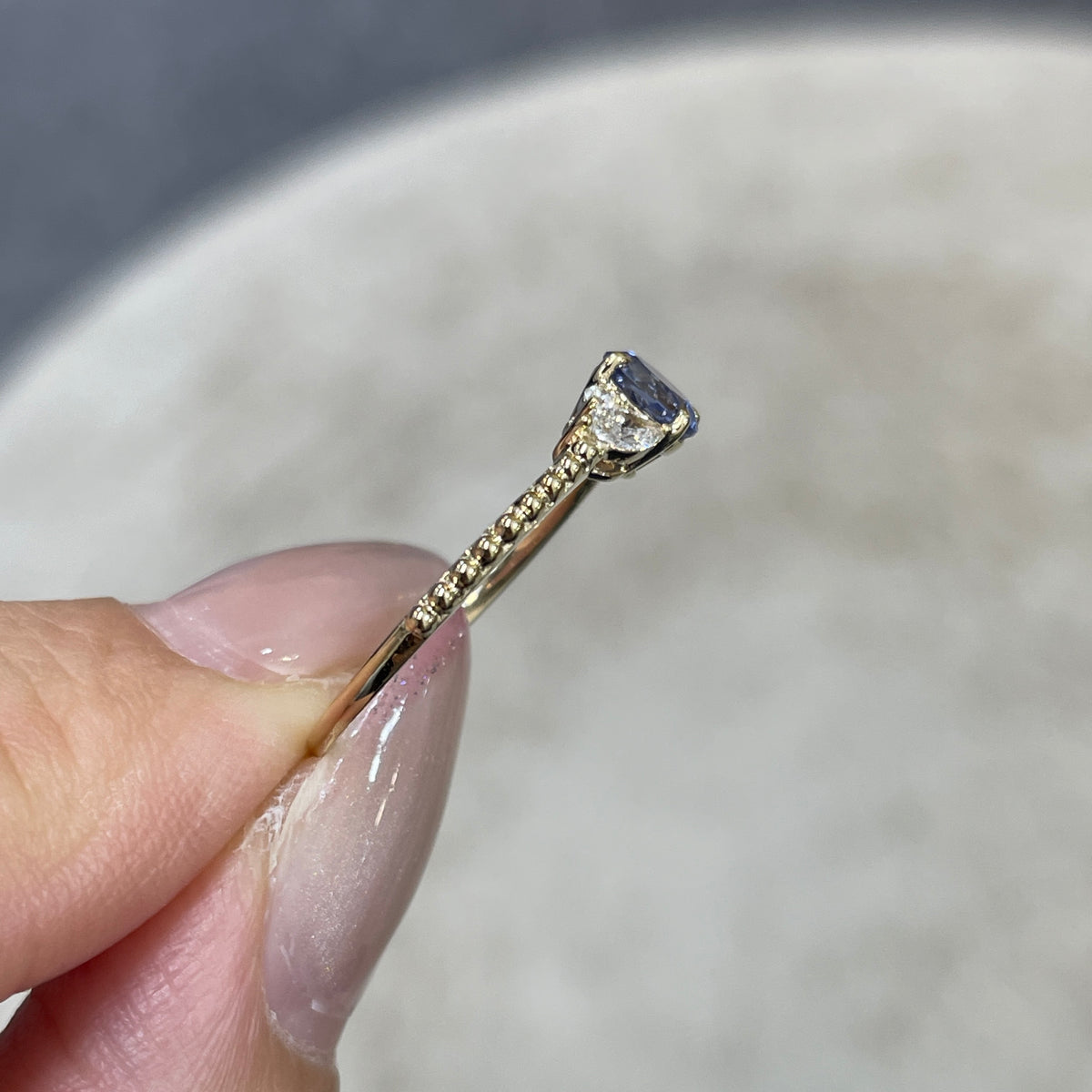 9k Lab grown sapphire cornflower round 0.6ct with marquise side stone milgrain ring