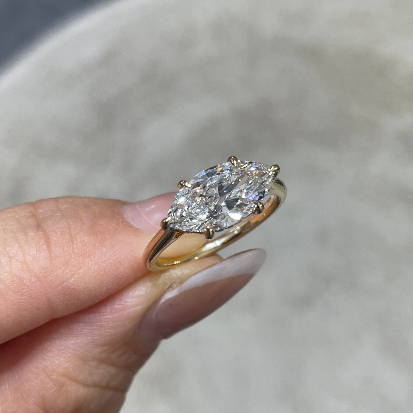 IGI lab diamond marquise shape 2ct four-prong underhalo east west ring