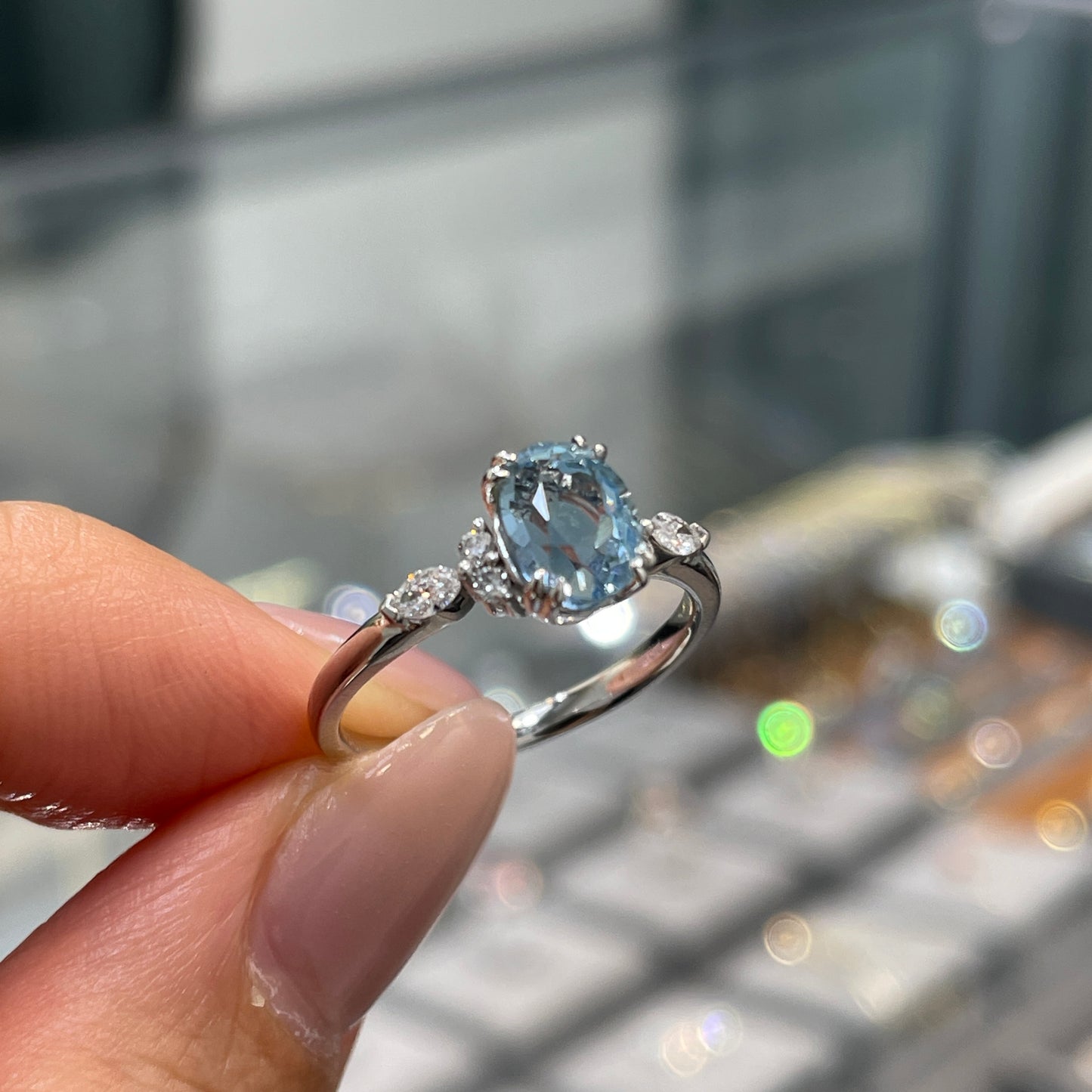 Lab sapphire aquamarine color Oval shape 1.2ct with diamond side stone ring