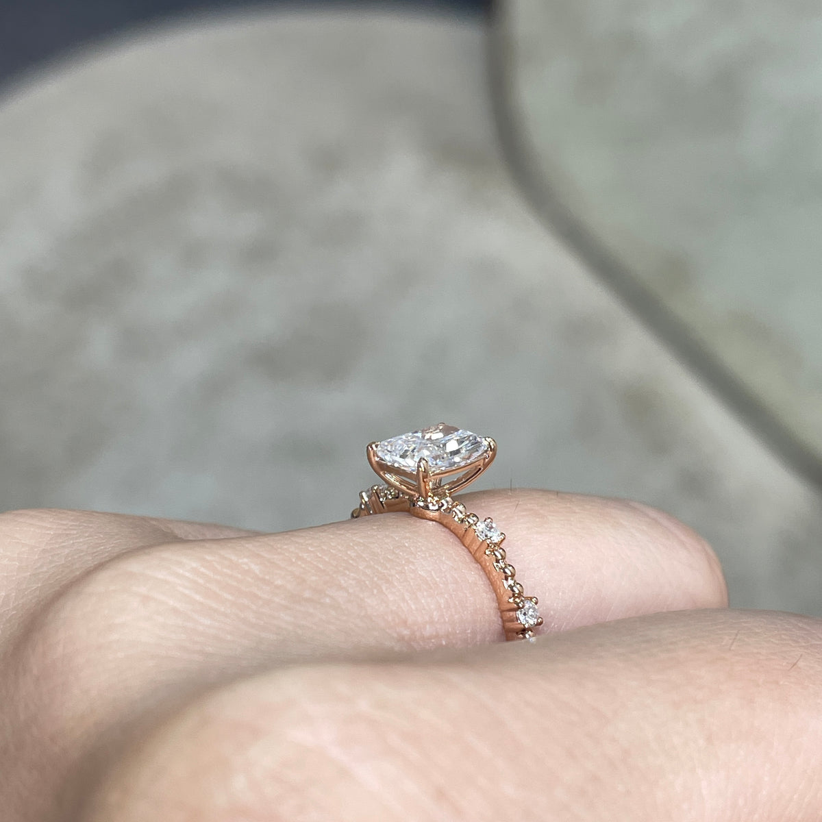 Lab Diamond radiant cut 1ct four-prong side stone with milgrain band ring