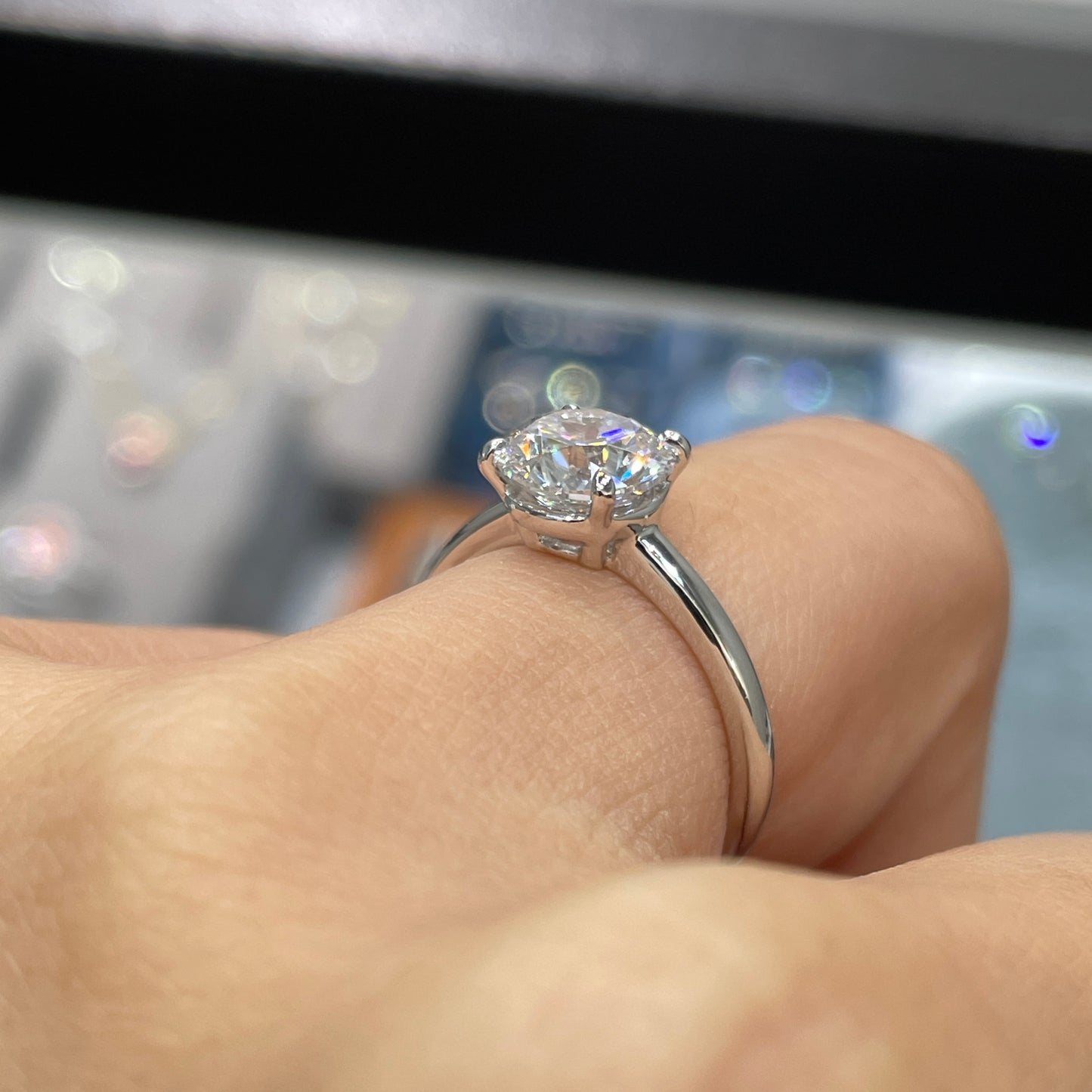 IGI lab diamond round 1.5ct four-prong low setting solitaire ring