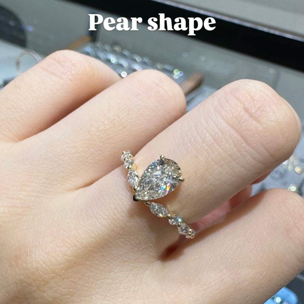 IGI lab diamond Pear shape  1.1ct with marquise round mix v shape pave ring