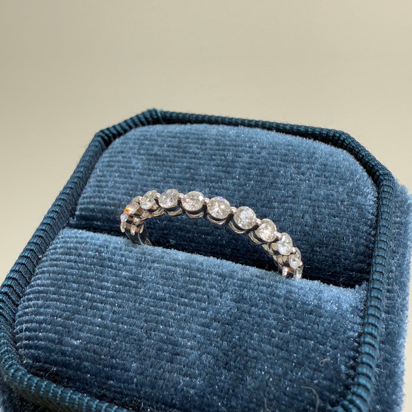 Lab diamond round 0.6ct single prong half eternity ring