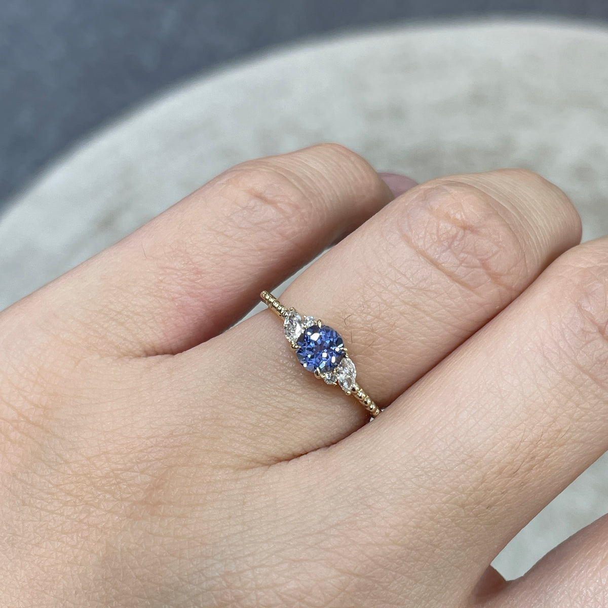 9k Lab grown sapphire cornflower round 0.6ct with marquise side stone milgrain ring
