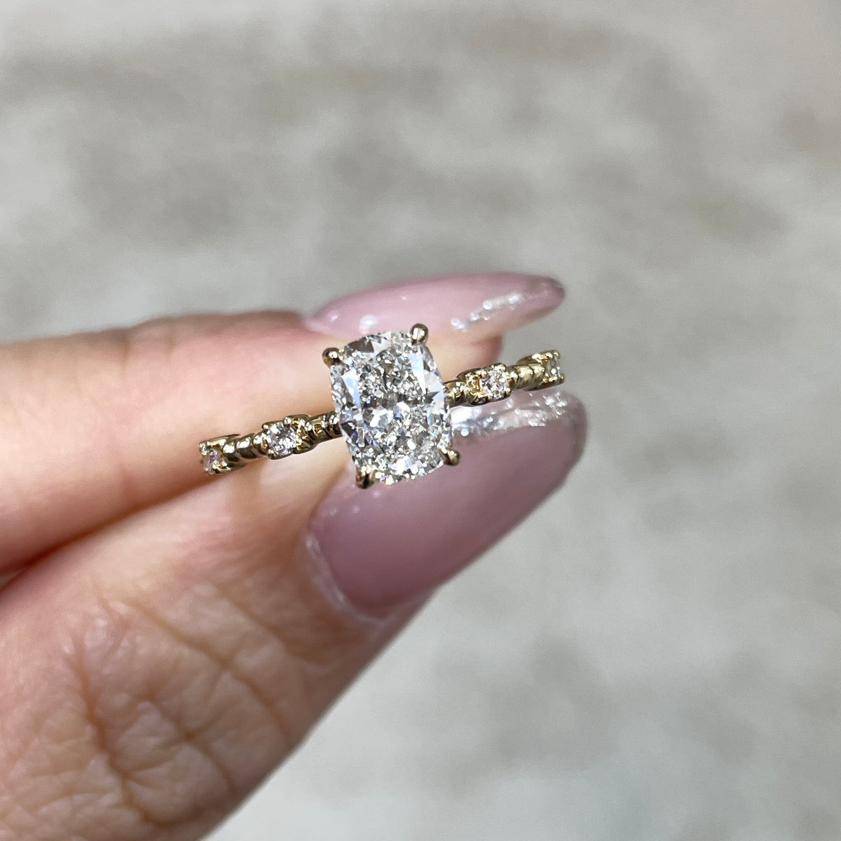 IGI Lab Diamond long cushion 1ct four-prong side stone with milgrain band ring