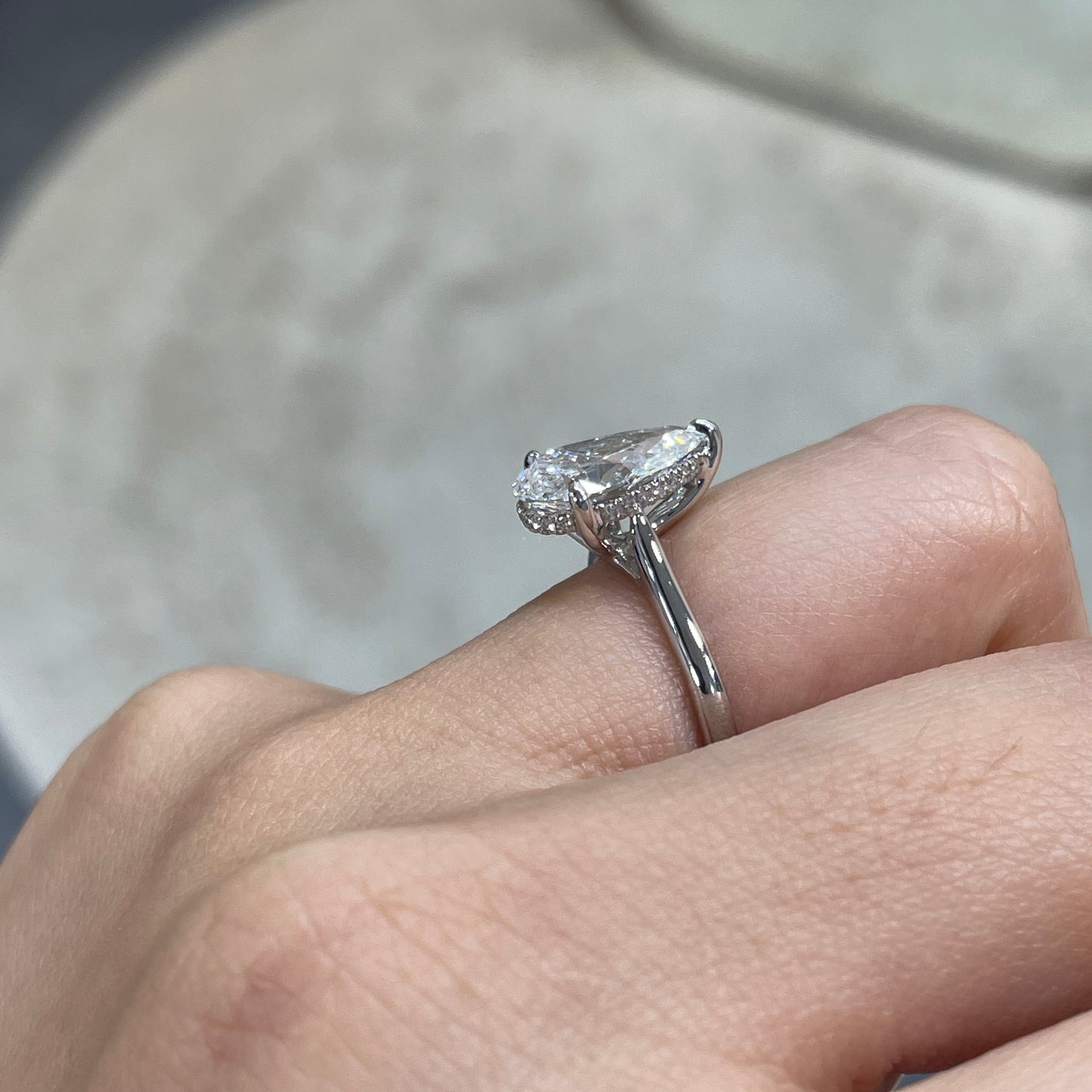 IGI Lab diamond pear shape 2.27ct three-prong underhalo ring