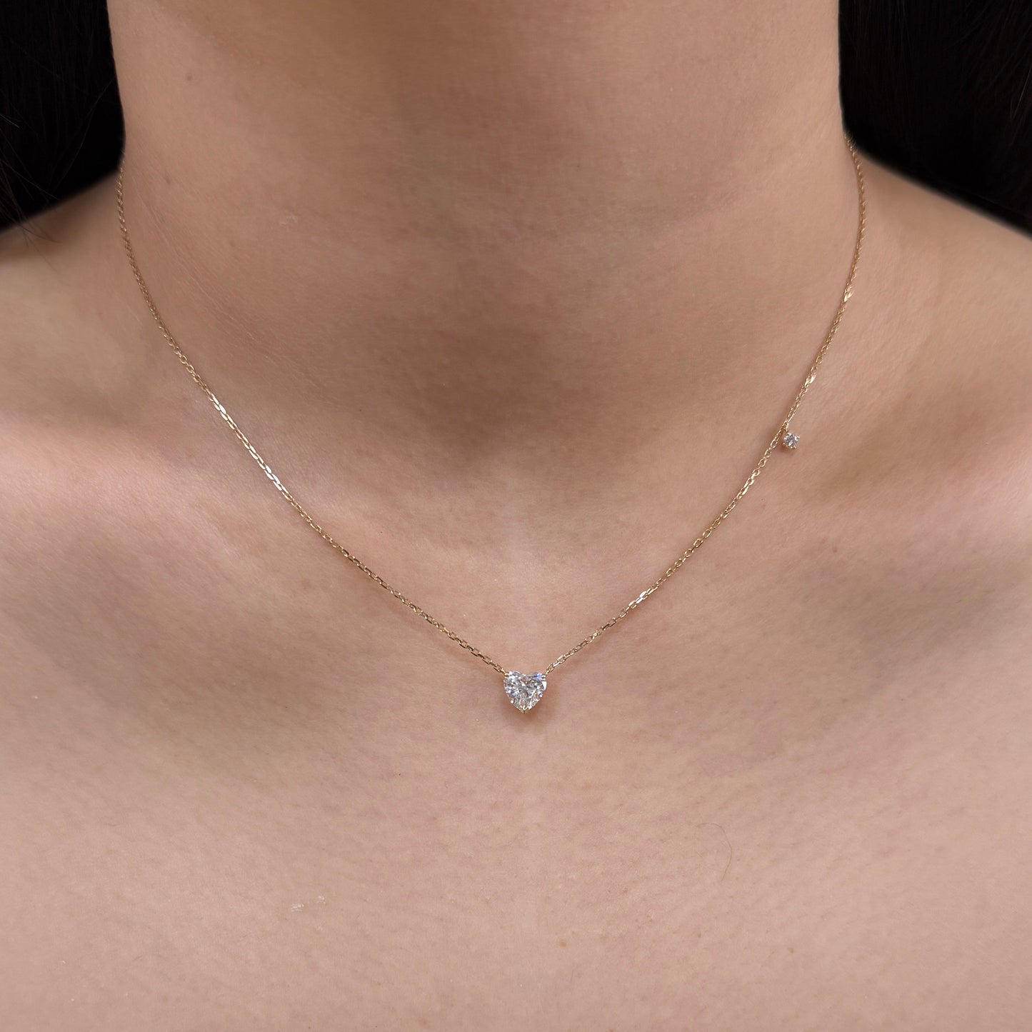 Lab diamond heart shape 0.78ct three-prong with little diamond necklace