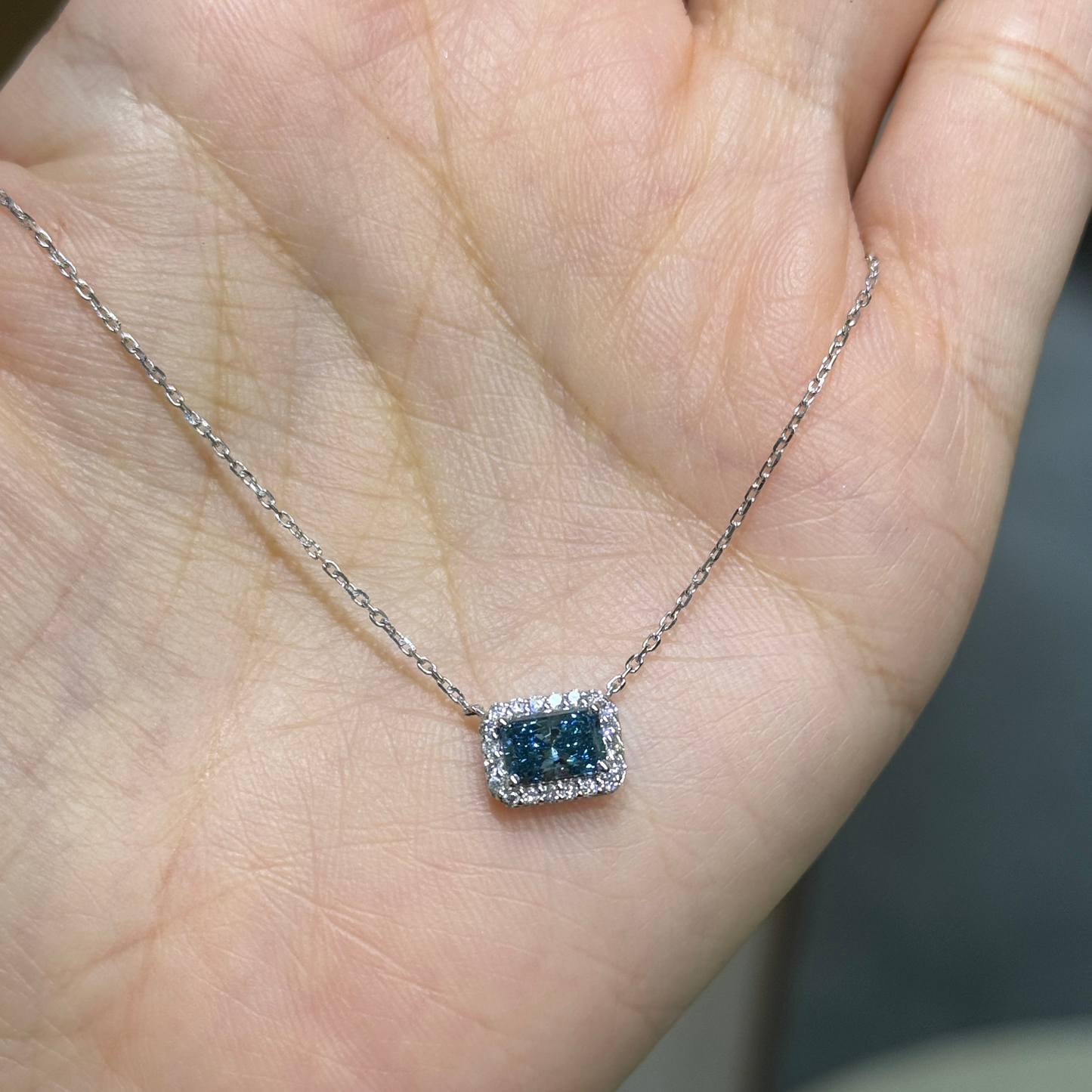 IGI lab blue diamond Radiant cut 0.8ct halo necklace