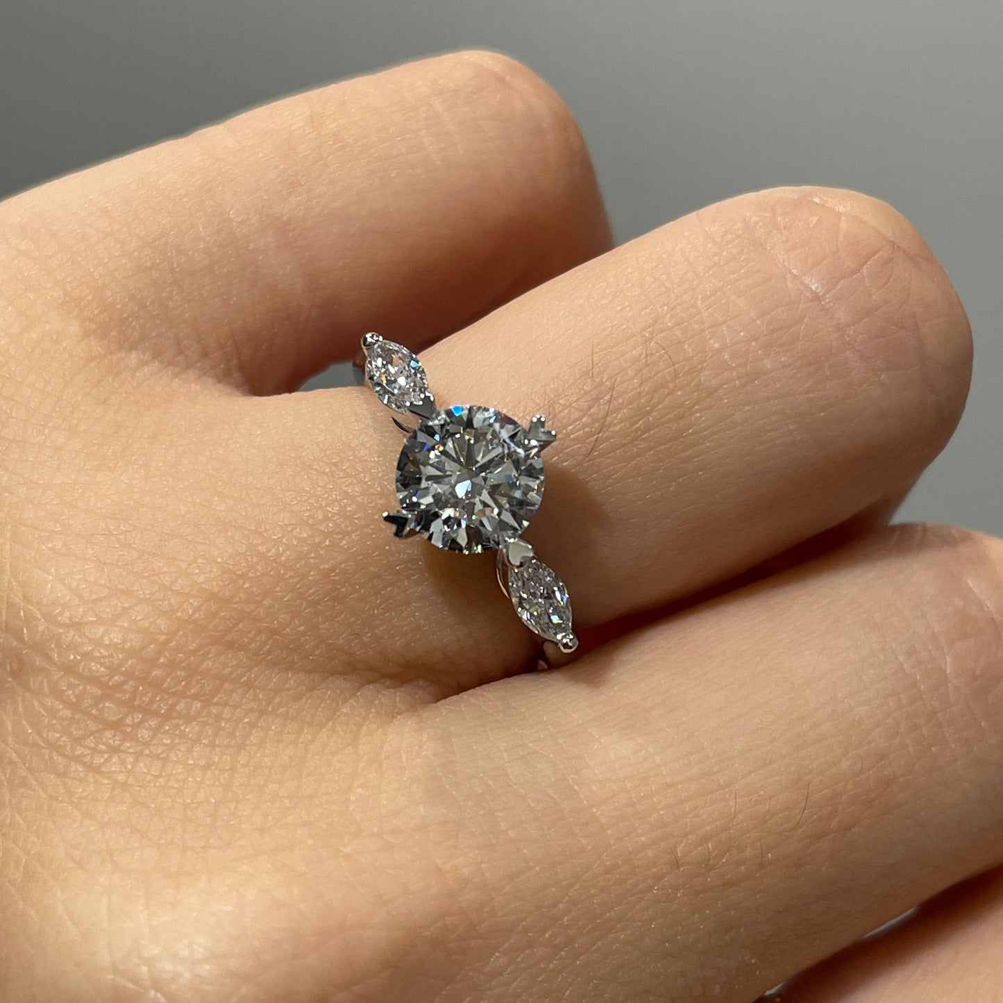 IGI Lab diamond round 1.3ct with marquise 0.3ct three stone ring