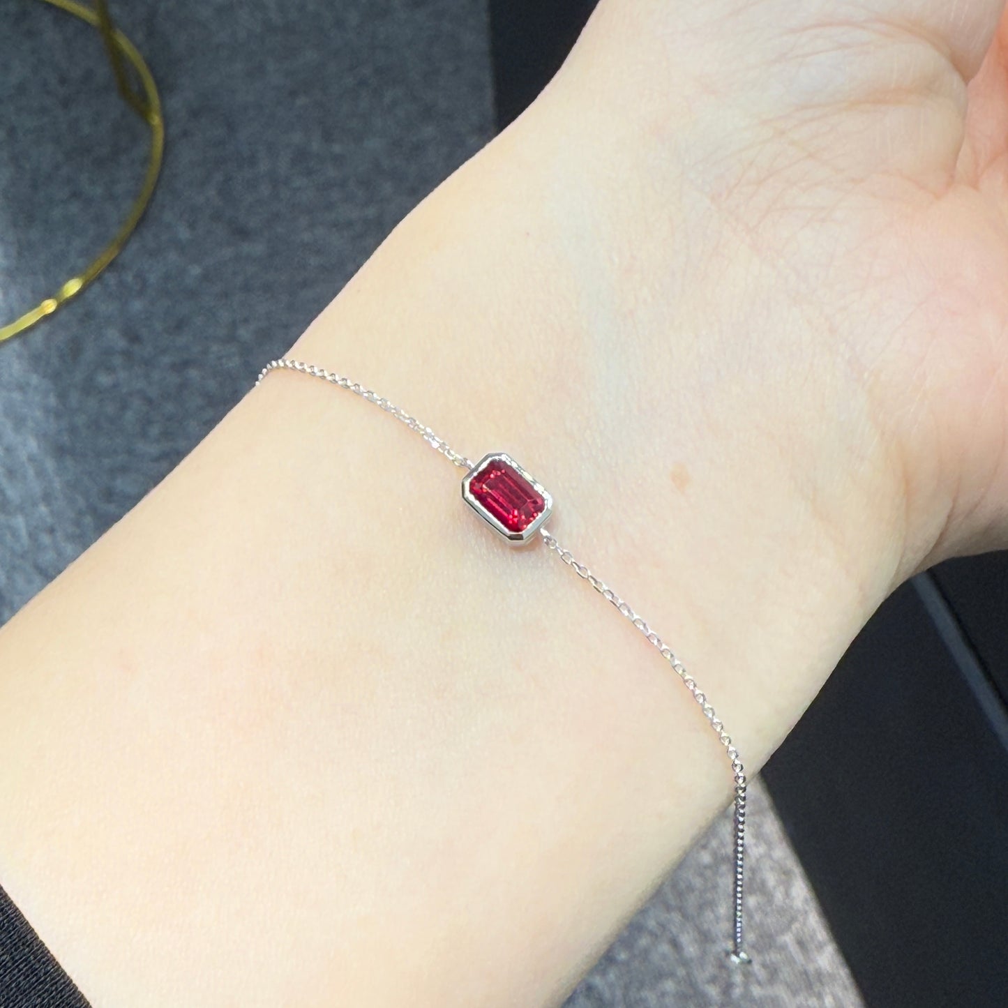 Lab  Ruby emerald cut 0.5ct bezel bracelet