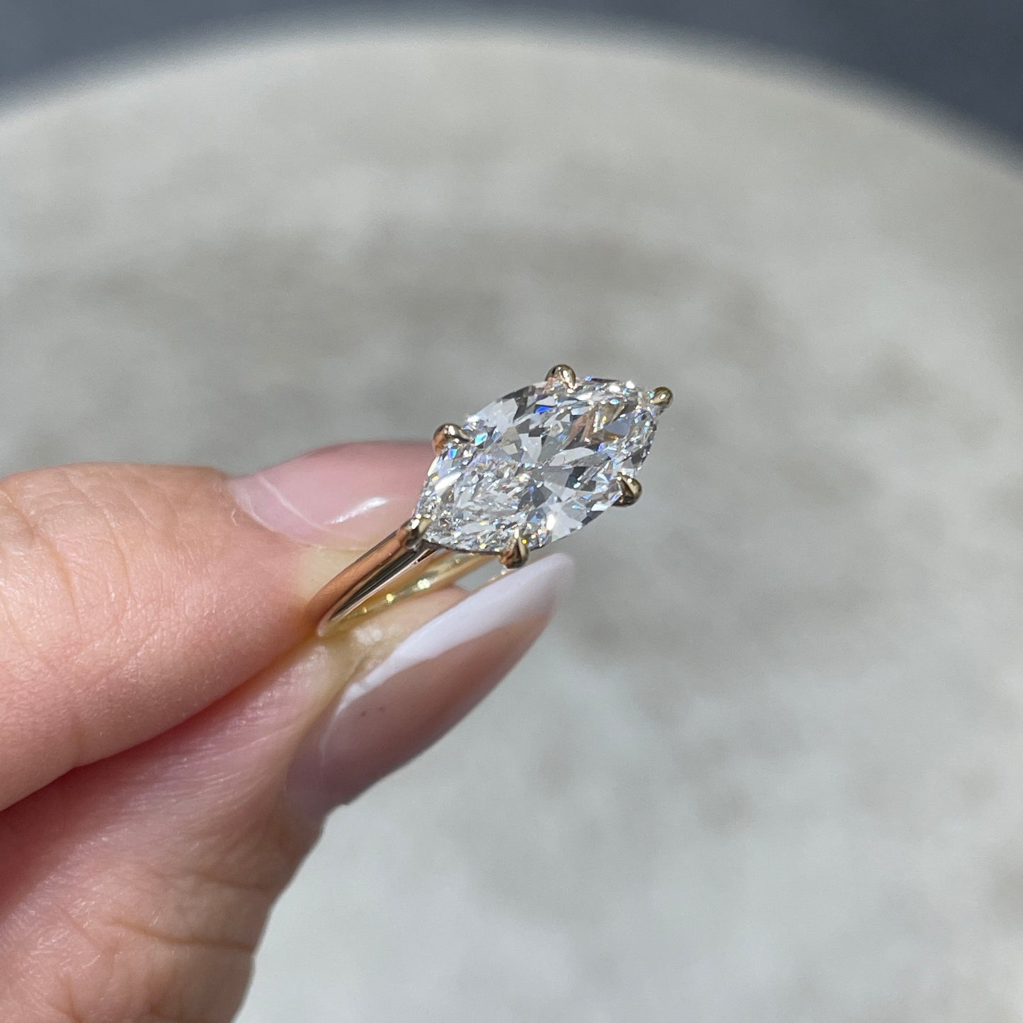 IGI lab diamond marquise shape 2ct four-prong underhalo east west ring