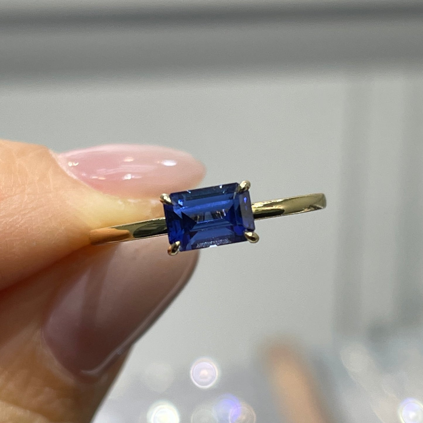 Lab sapphire cornflower color emerald cut 0.9ct solitaire ring