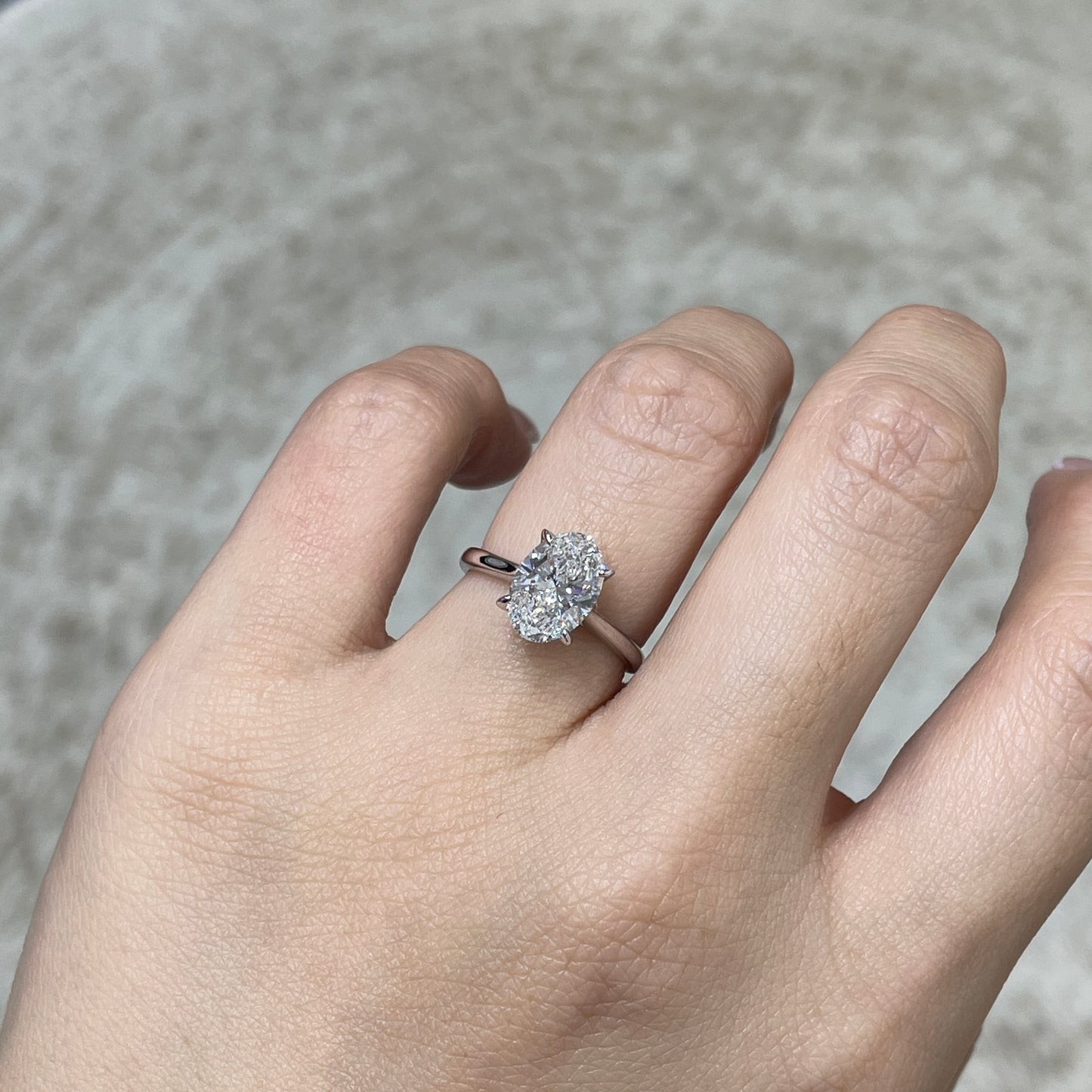 IGI Lab diamond Oval shape 2ct four-prong under halo ring