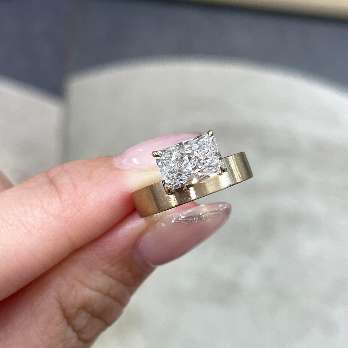 9k IGI Lab diamond long radiant cut 1.8ct four-prong horizontal top setting thick flat brushed ring