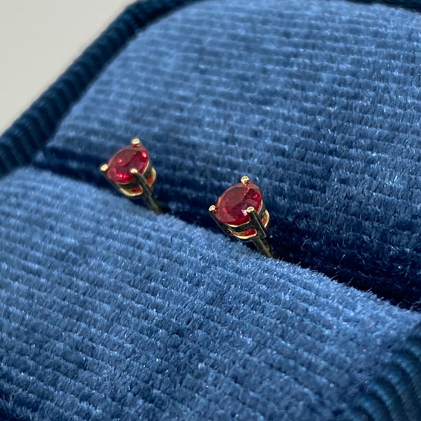 Lab grown ruby round 0.3ct stud earrings-pair