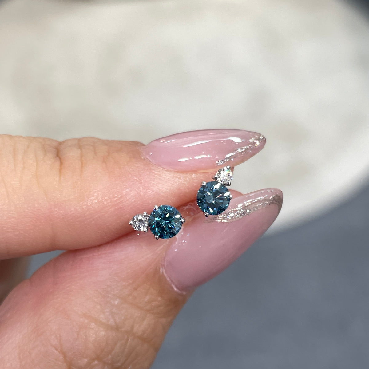 Lab blue diamond round 0.42ct toi et moi stud earrings - pair